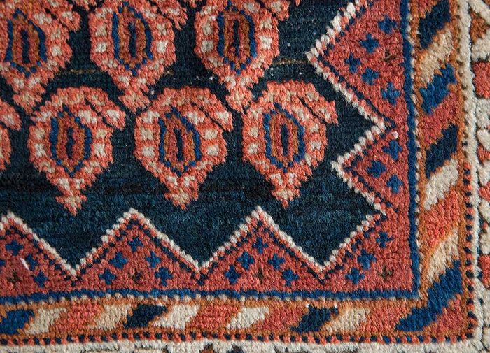 antique blue wool hand knotted Rug - CloseUp