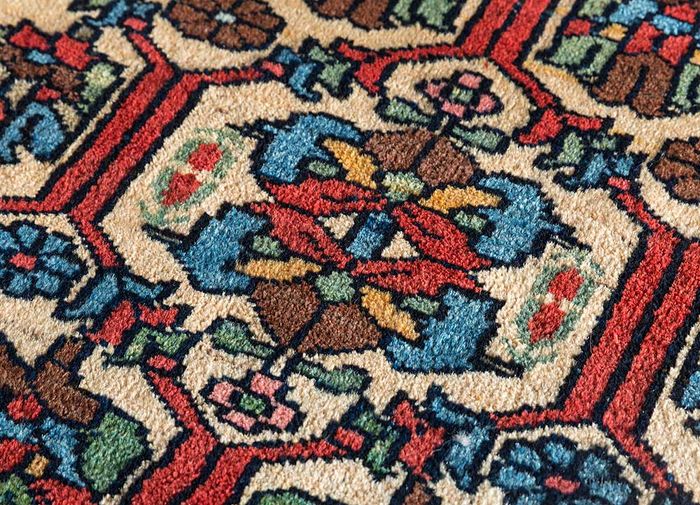 antique red and orange wool hand knotted Rug - CloseUp