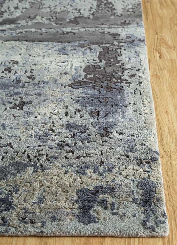 entropy blue wool and silk hand knotted Rug - Corner