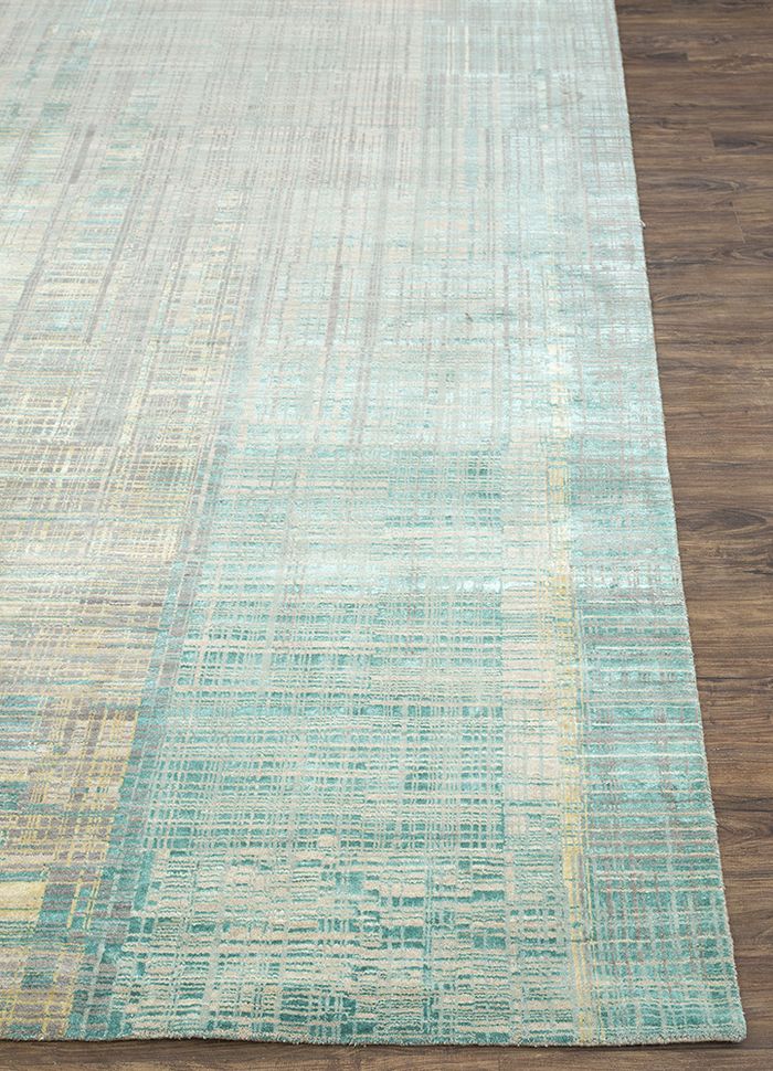 unstring by kavi ivory wool and bamboo silk hand knotted Rug - Corner