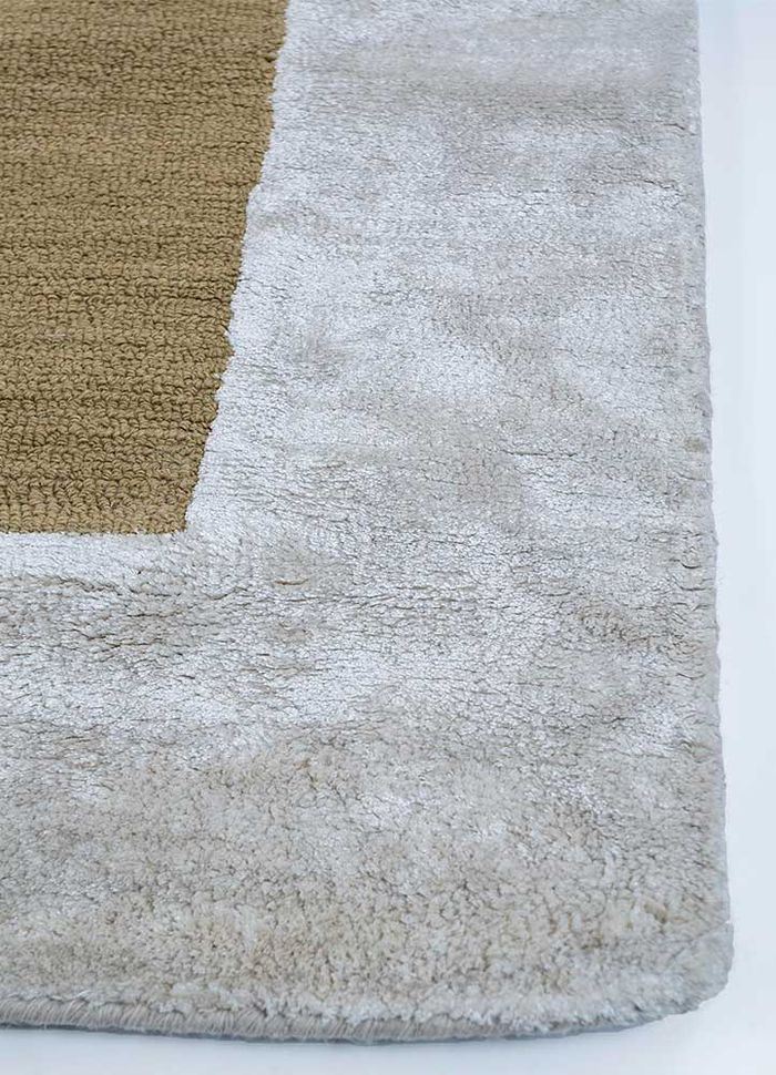 linear gold wool and viscose hand tufted Rug - Corner