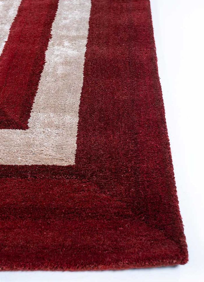 linear red and orange wool and viscose hand tufted Rug - Corner