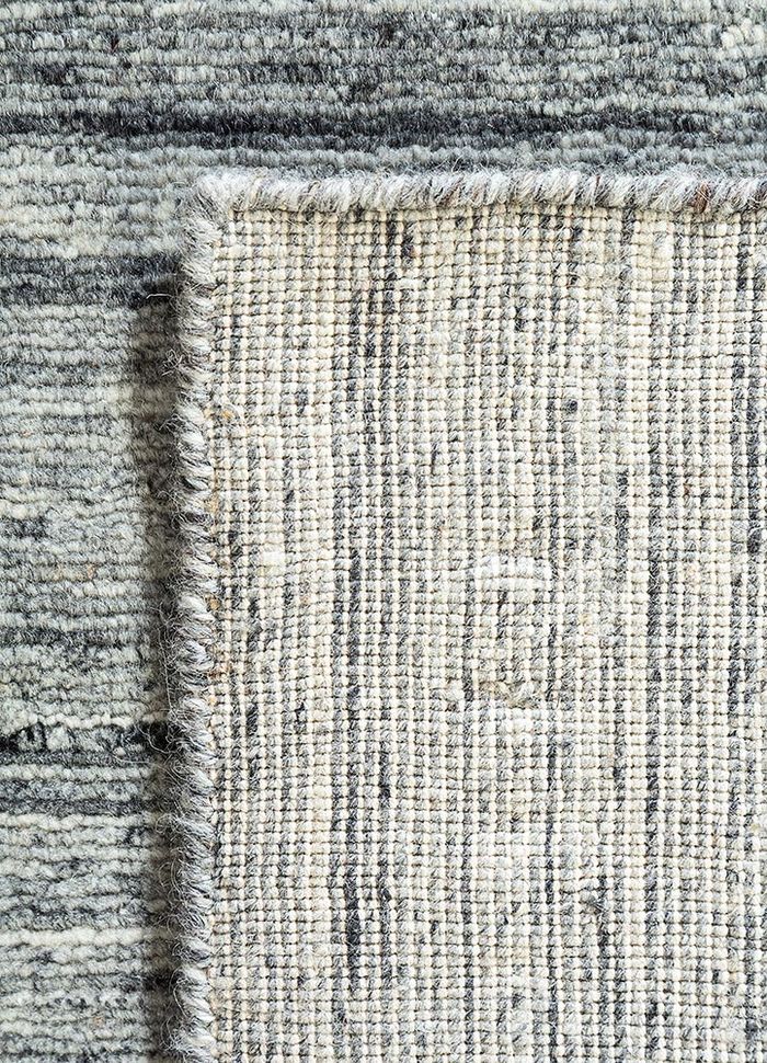 eron grey and black wool hand loom Rug - Perspective