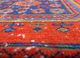 vintage red and orange wool hand knotted Rug - CloseUp