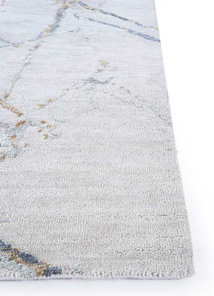 urban pause by kavi ivory wool and silk hand knotted Rug - Corner