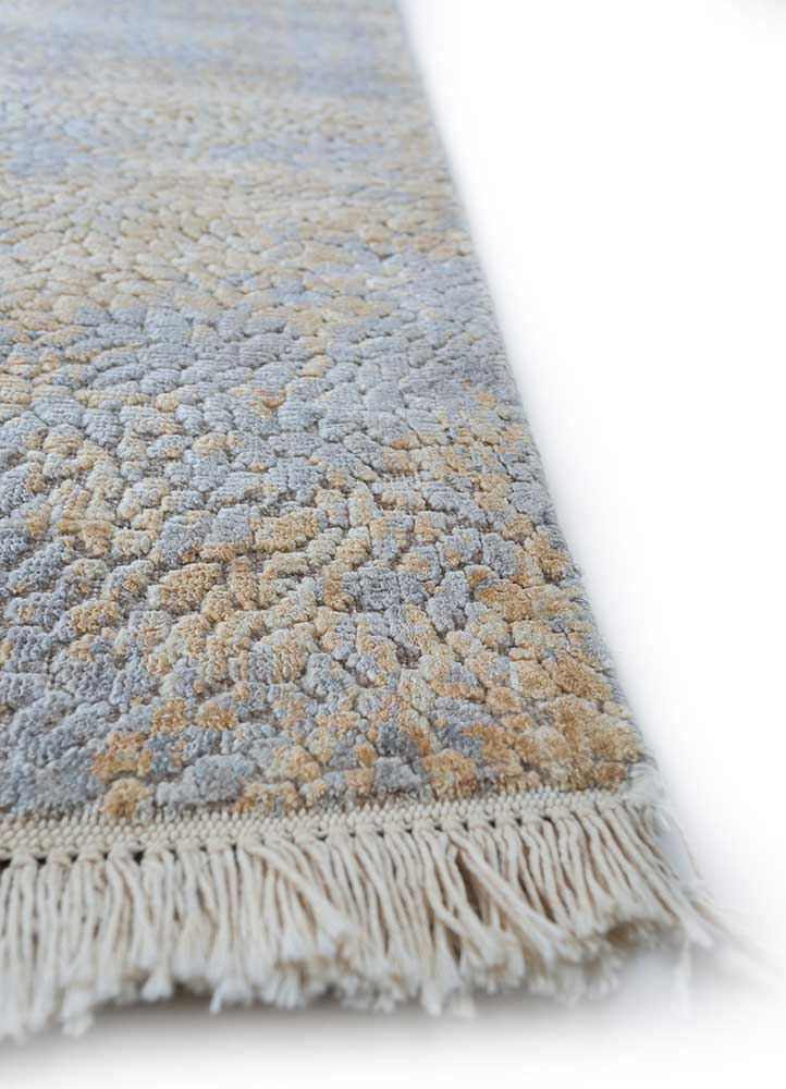unstring by kavi gold wool and bamboo silk hand knotted Rug - Corner
