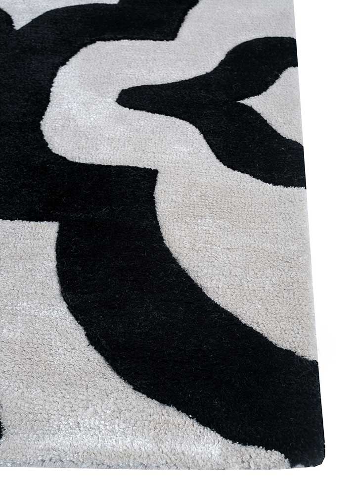 contour ivory wool and viscose hand tufted Rug - Corner