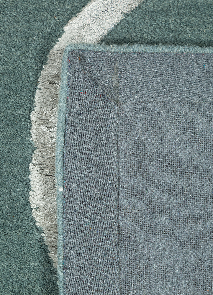 contour blue wool and viscose hand tufted Rug - Perspective