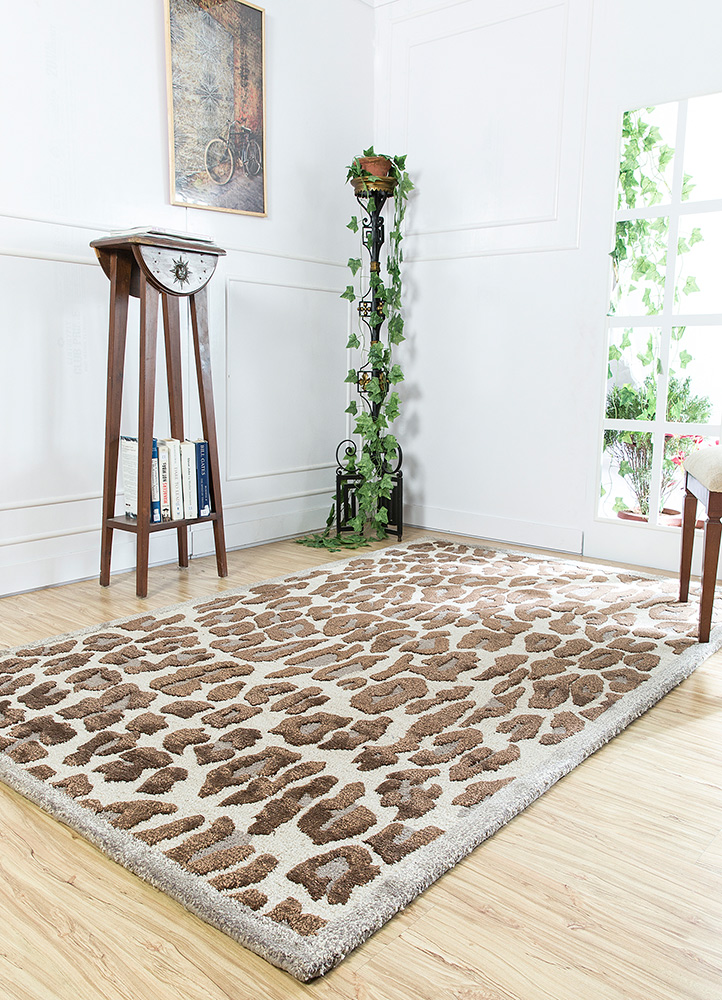 village by artemis ivory wool and viscose hand tufted Rug - RoomScene